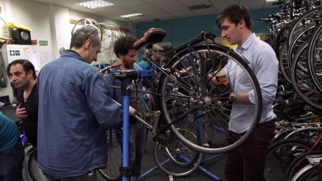 People work on bikes at the Bike Project in London