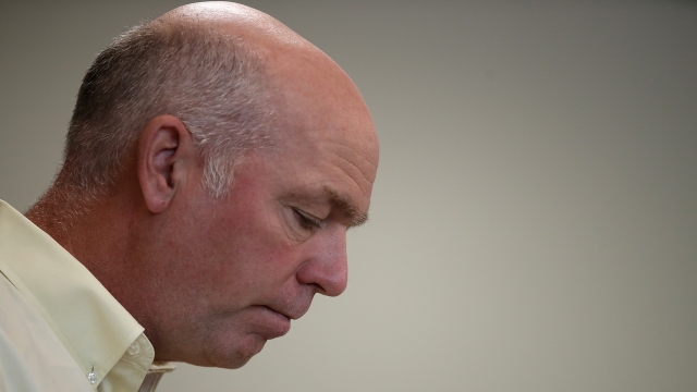 Greg Gianforte looks on during a campaign meet and greet.