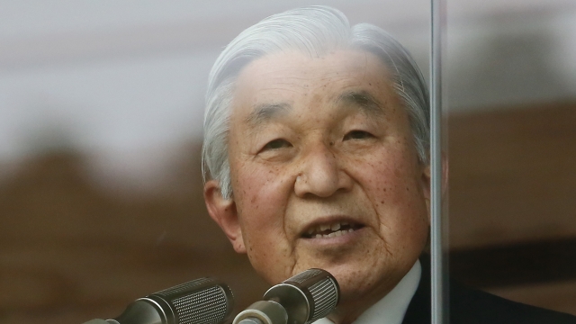 Emperor Akihito speaks to well-wishers during the celebration for the New Year.