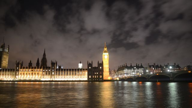 A nighttime view of the Houses of Parliament in London, England