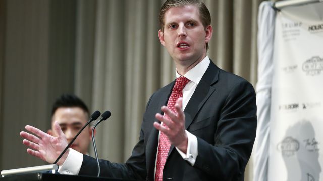Eric Trump speaking at a ceremony for a Trump building opening.