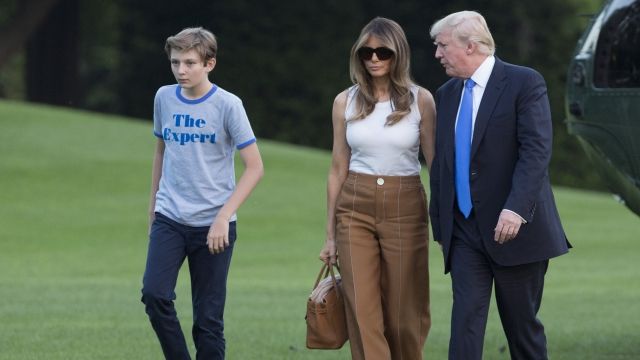 Barron Trump, first lady Melania Trump and President Donald Trump arriving at the White House.