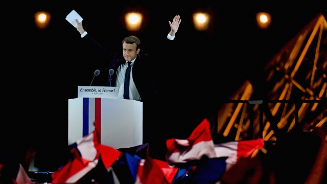 French President Emmanuel Macron in front of supporters.