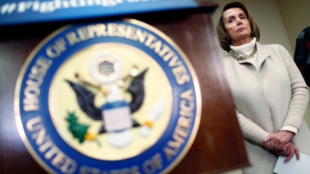 Nancy Pelosi attends an opening news conference during the House Democratic caucus
