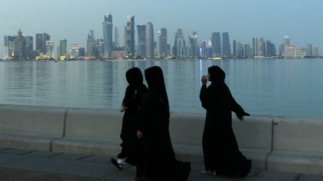 Women walking on the streets of Doha, Qatar