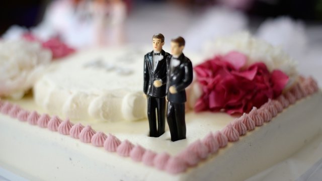 A wedding cake for same-sex couples at a wedding celebration.