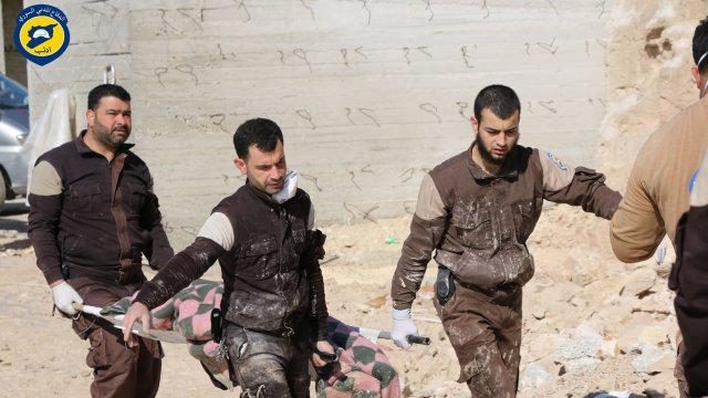 Syria Civil Defense volunteers help victims after a chemical attack in April 2017.