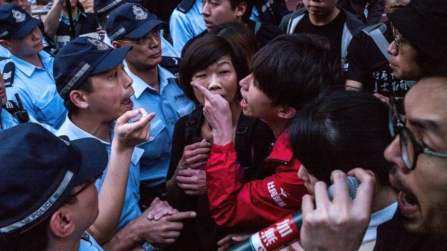 Pro-democracy activists clash with Hong Kong police.