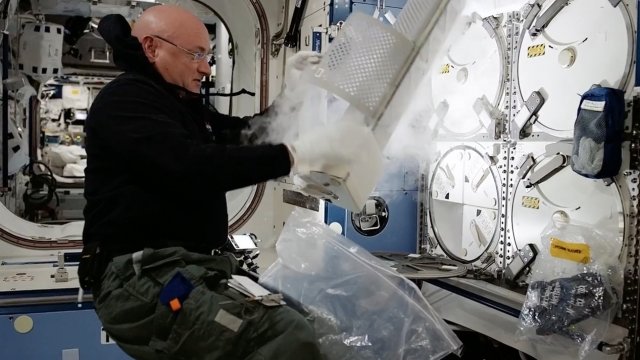 An astronaut researches how to develop organophosphate-fighting space crystals