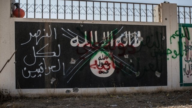 An Islamic State sign in the northwestern Iraq town of Ba'aj, June 20, 2017, near the Iraq-Syria border.