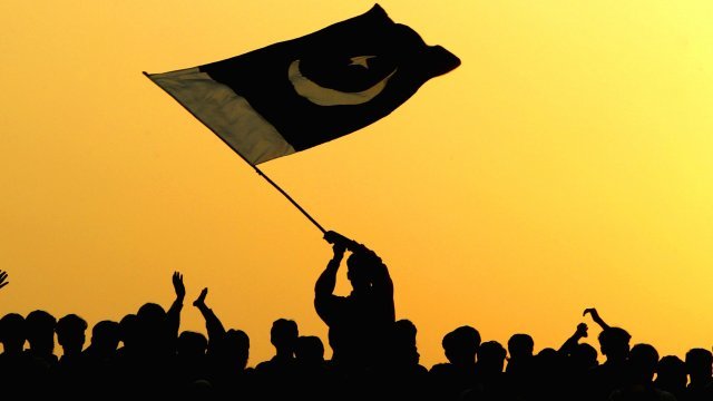 Pakistan flag being waved.