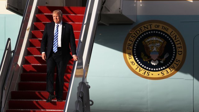 US President Donald Trump arrives on Air Force One at the Palm Beach International Airport.