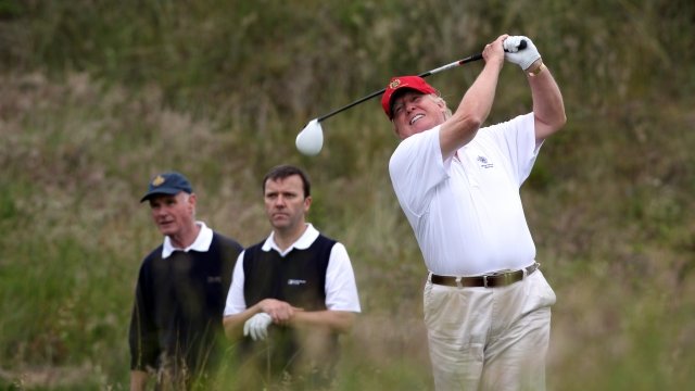 President Donald Trump golfing