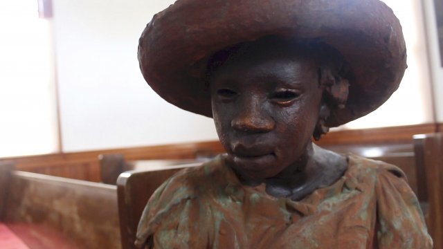 A sculpture of a child slave at the Whitney Plantation in Wallace, Louisiana