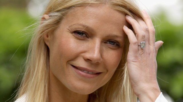 Gwyneth Paltrow poses at a party.
