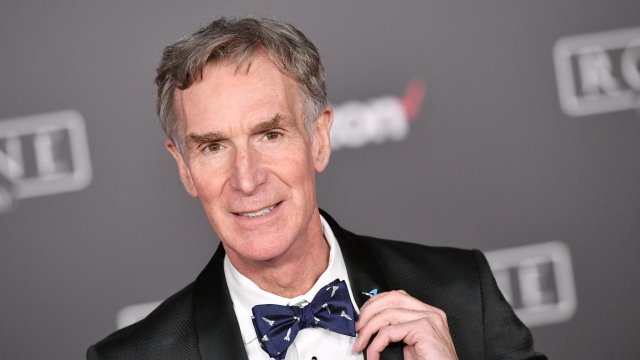 Bill Nye adjusting his bow tie