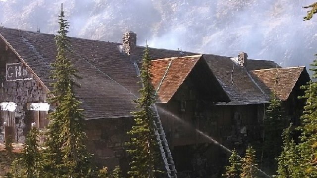 Sperry Chalet in Glacier National Park gets hosed down during wildfires on August 27, 2017.