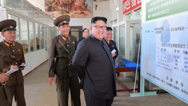North Korean leader Kim Jong-un examines his country's latest missile plans