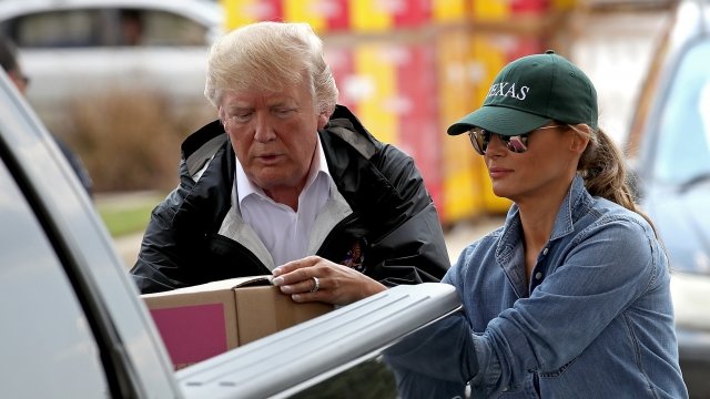 President Trump and first lady Melania Trump unloading supplies