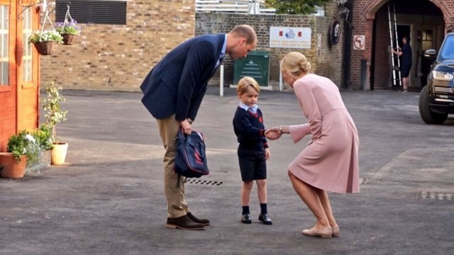 Prince William dropping off his son Prince George at school.