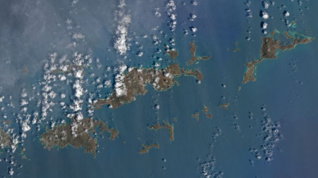 A satellite image from NASA shows the browning of the U.S. and British Virgin Islands after Hurricane Irma.