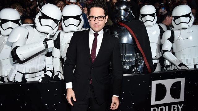 J.J. Abrams poses at the "Star Wars: The Force Awakens" premiere.
