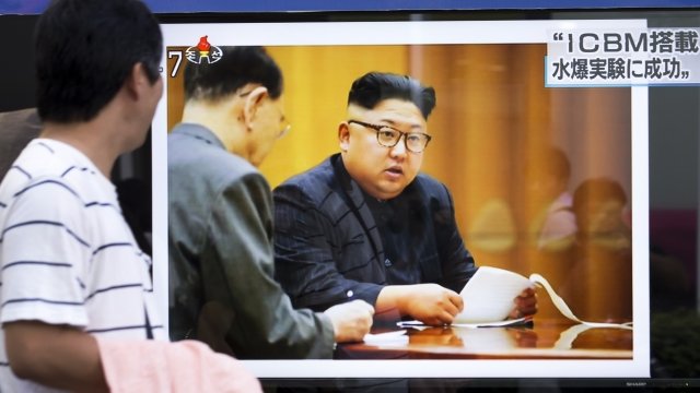 North Korea leader Kim Jong-un on a TV screen