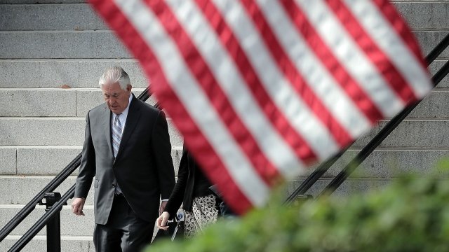 Rex Tillerson leaves Eisenhower Executive Office Building.