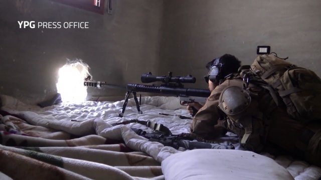 A YPG sniper in Raqqa, Syria.