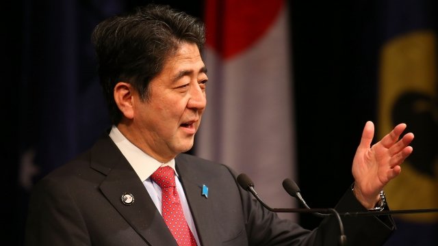 Japanese Prime Minister Shinzo Abe addresses guests during an official dinner.