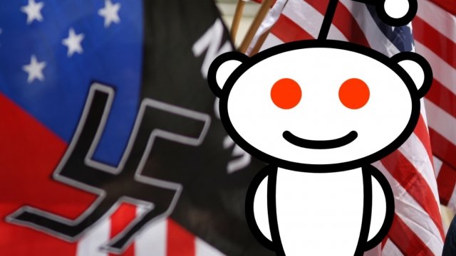 Reddit's logo in front of a swastika