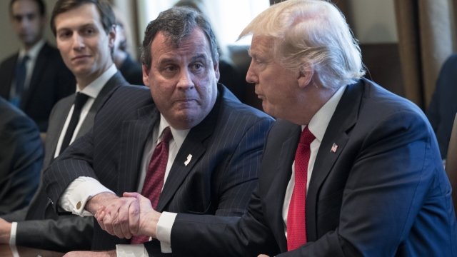 President Donald Trump hakes hands with New Jersey Governor Chris Christie at discussion on opioids