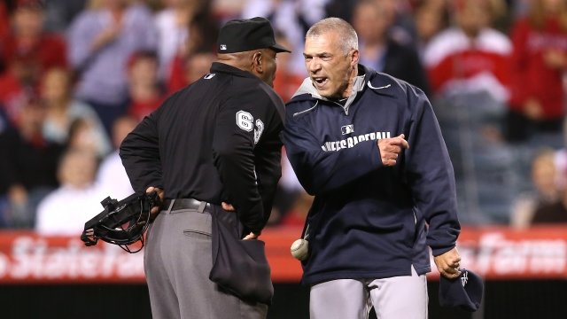Yankees manager Joe Girardi argues with an umpire.