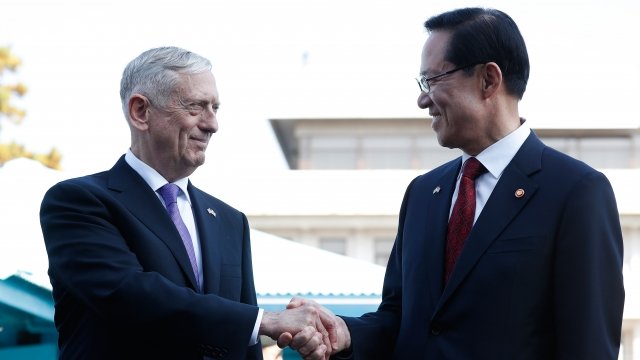 U.S. Secretary of Defense James Mattis shaking hands with South Korean Defense Minister Song Young-moo.