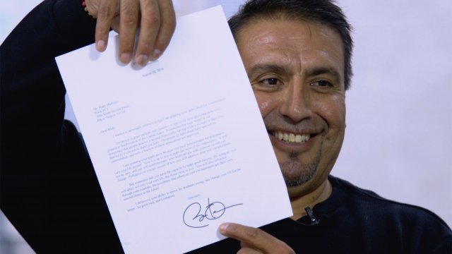 Rudy Martinez shows off his commutation letter from President Barack Obama.