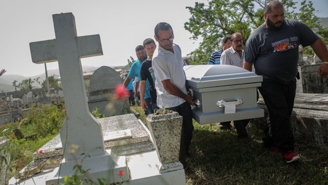 Mourners carry a casket in Puerto Rico