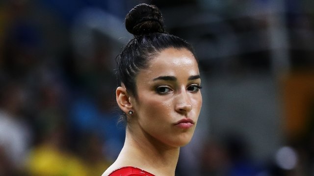 Aly Raisman of the United States prepares to compete on the balance beam.