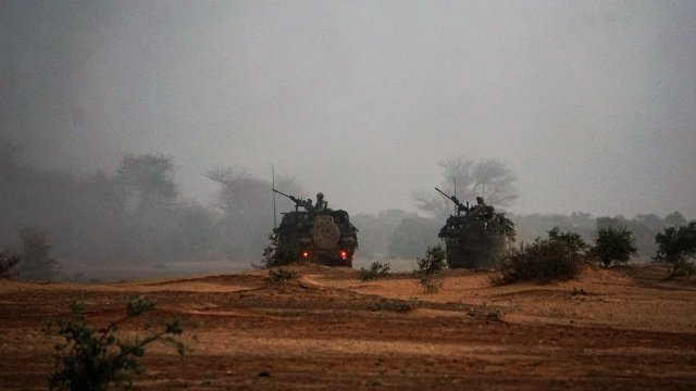 Military vehicles sit in Niger.