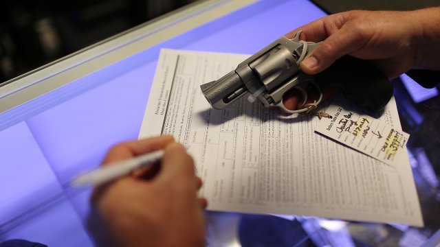 Federal background check paperwork to purchase handgun.
