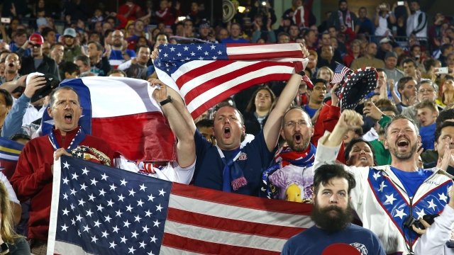 US Soccer fans in the stands at a game.