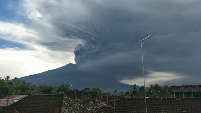 Clouds of thick ash emerge from Mount Agung in Bali.