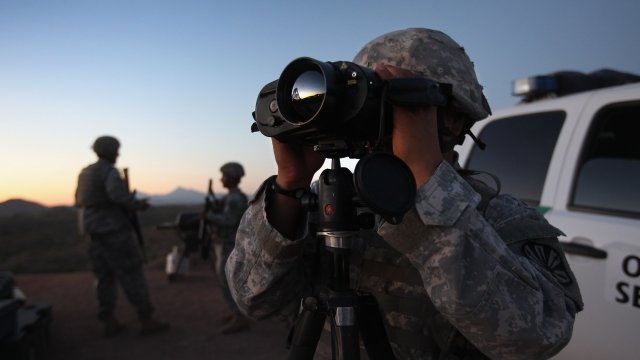 Arizona National Guard members monitor the border