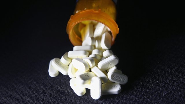 An open bottle of pills