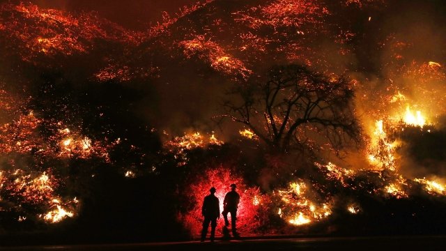Firefighters monitor a section of the Thomas Fire.
