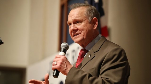 Roy Moore talks to a crowd.