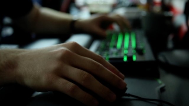 A "League of Legends" player at his keyboard