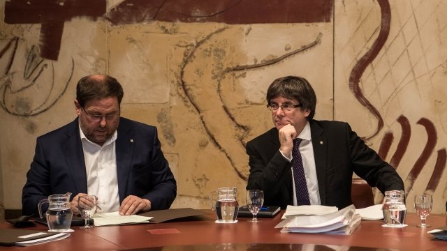 Oriol Junqueras, left, and Carles Puigdemont