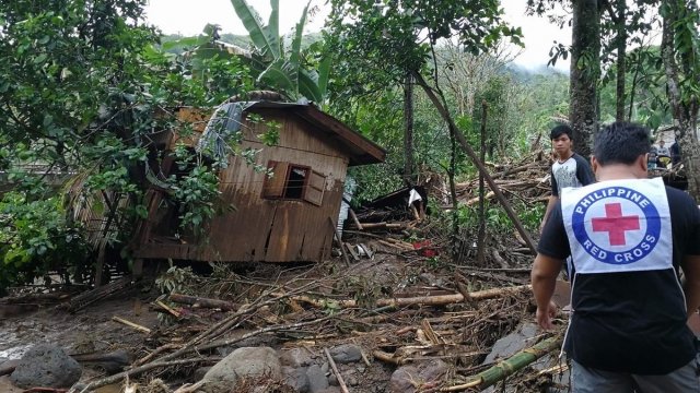 Red Cross workers after Tropical Storm Tembin