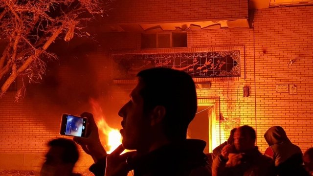 Protester in Iran filming protest, fire