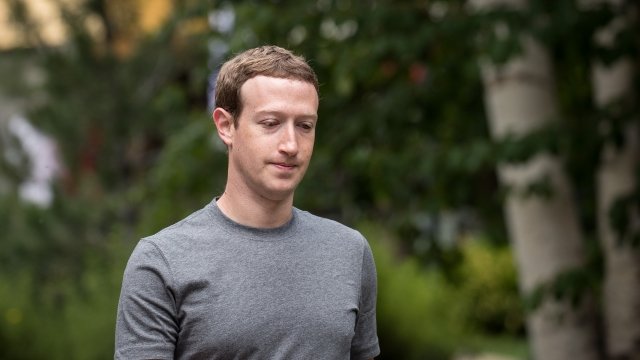 Mark Zuckerberg walks outside